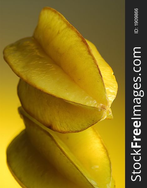 Carambola, water and mirror surface. Carambola, water and mirror surface