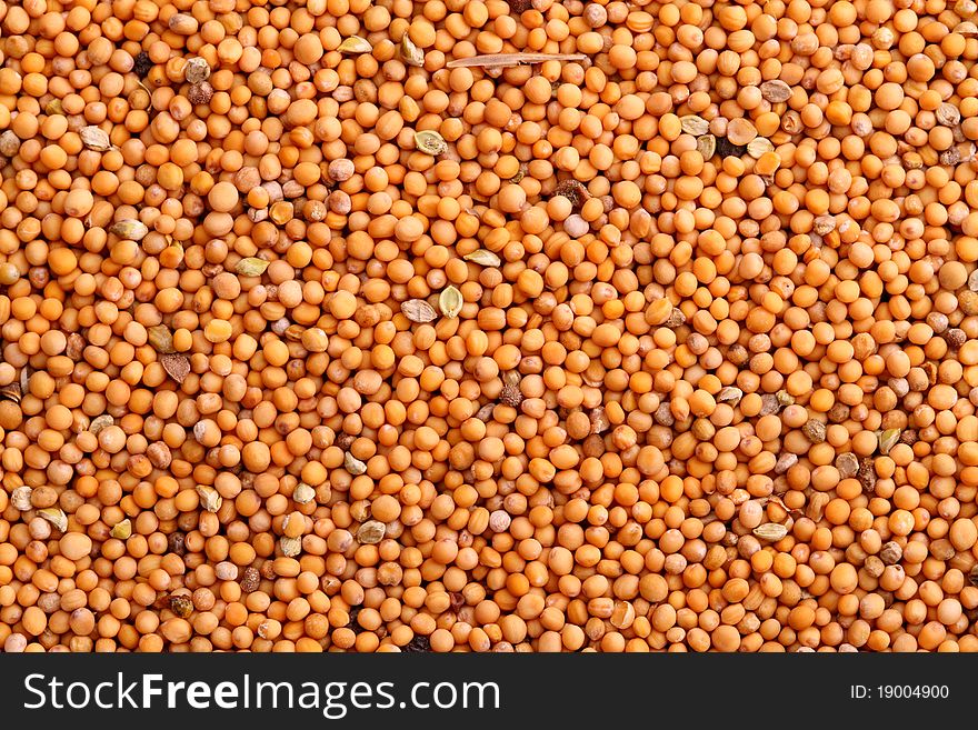 Mustard seeds background. A series of food backgrounds