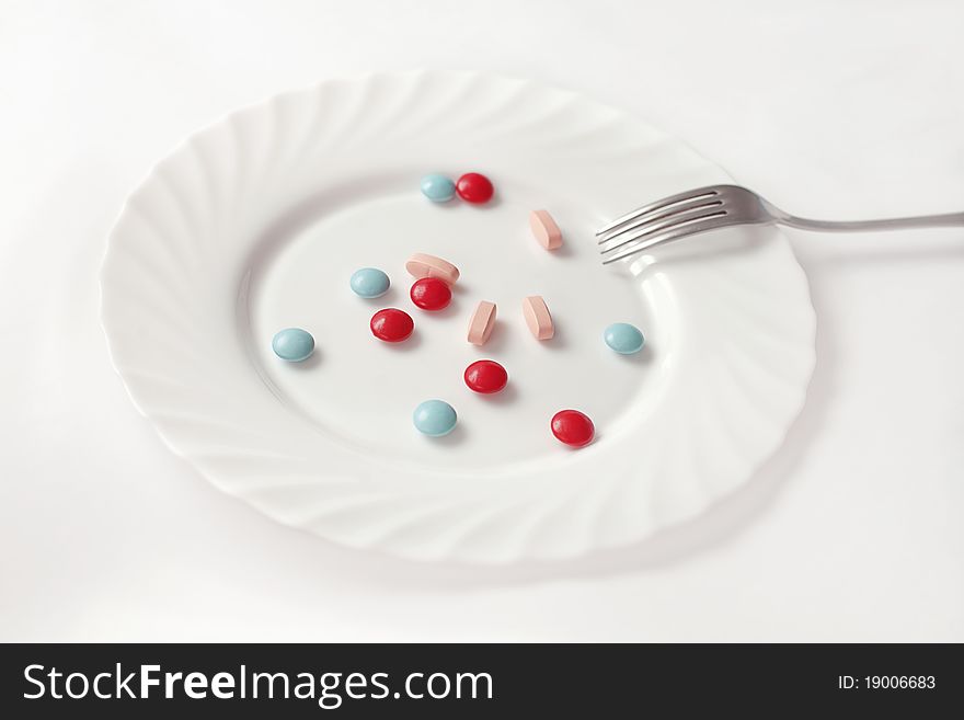 Pills in a plate