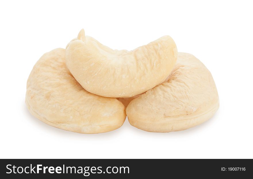 A handful of cashew nuts on a white background. A handful of cashew nuts on a white background.