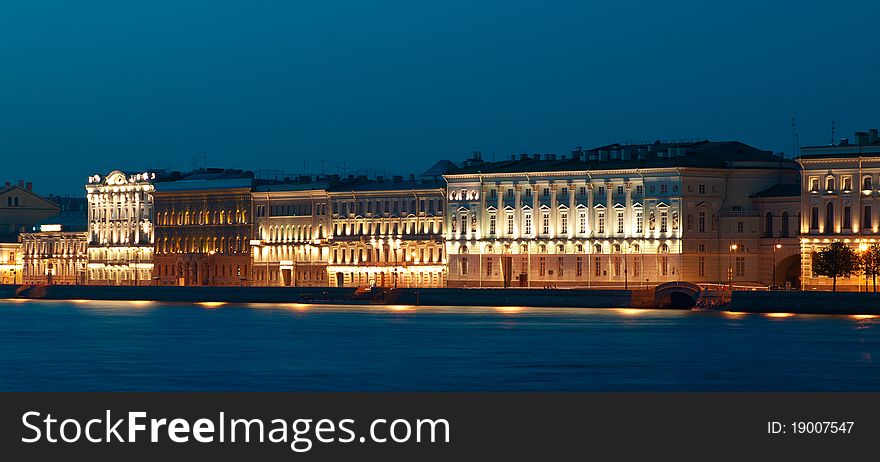 Night urban landscape with river. Saint-Petersburg, Russia