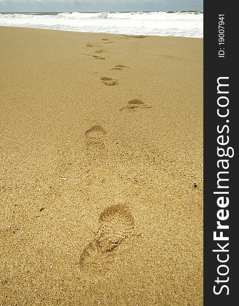 Footsteps at beach on a stormy day. Footsteps at beach on a stormy day