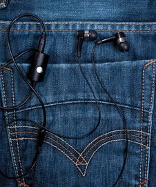 Headset In Back Pocket Royalty Free Stock Photo