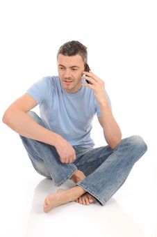 Casual Young Man Speaking On Phone Royalty Free Stock Photo
