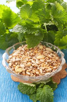 Seeds In  Bowl With Herbs Royalty Free Stock Images