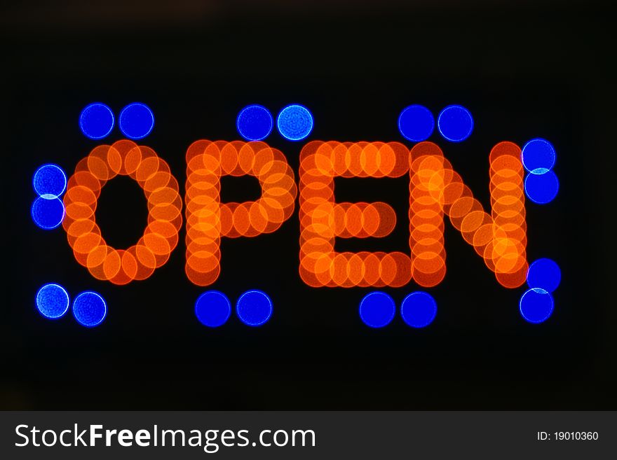 Open sign light in dark background