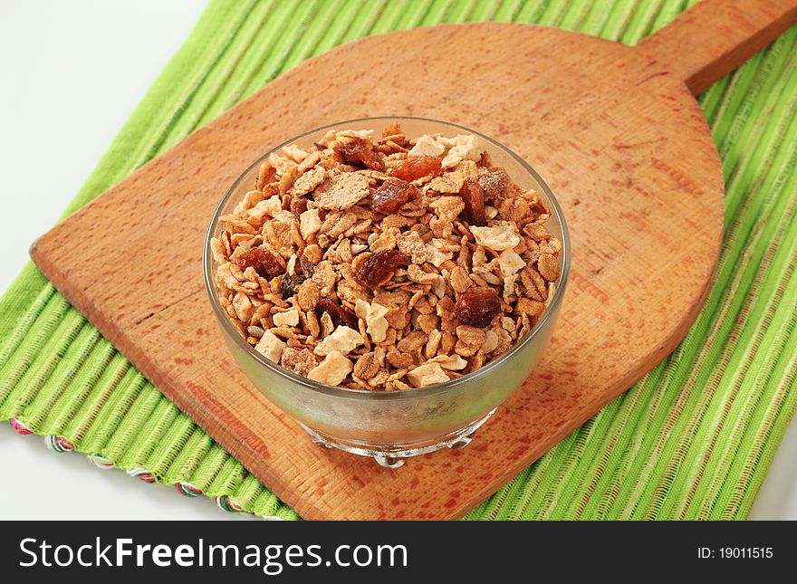 Bowl of mixed breakfast cereals and dried fruit