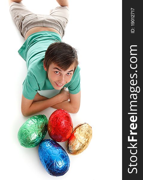 Boy with four large easter eggs