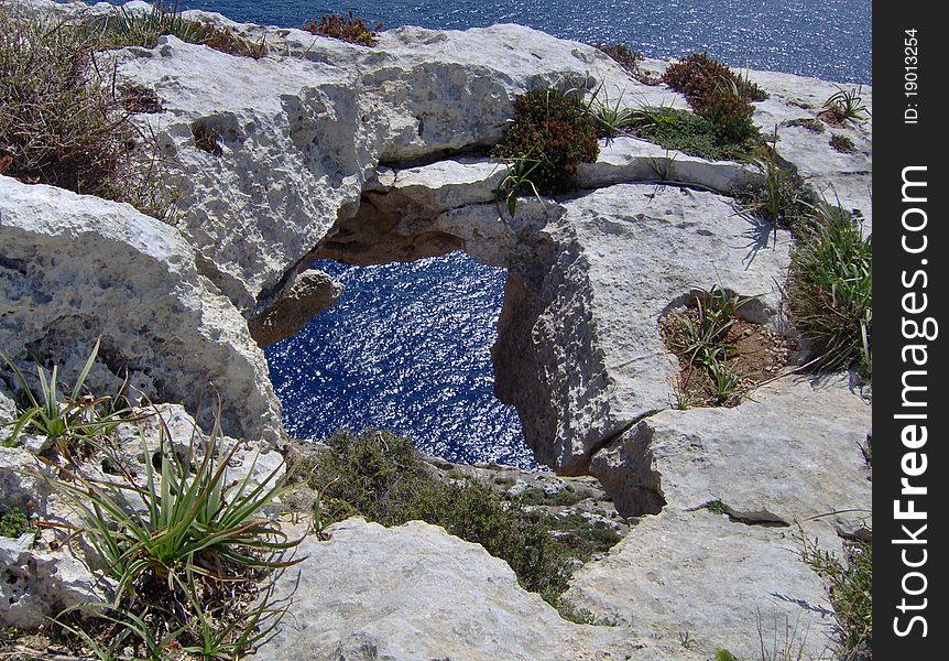 Erosion results on the cliffs near Blue Grotto in the limits of Zurrieq, Malta. Erosion results on the cliffs near Blue Grotto in the limits of Zurrieq, Malta