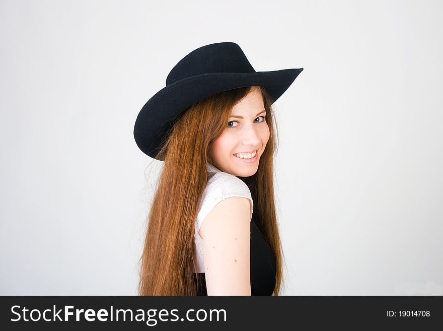 Portrait beautiful girl with hat in studio on white background. Portrait beautiful girl with hat in studio on white background