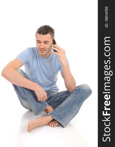 Casual Young Man Speaking On Phone