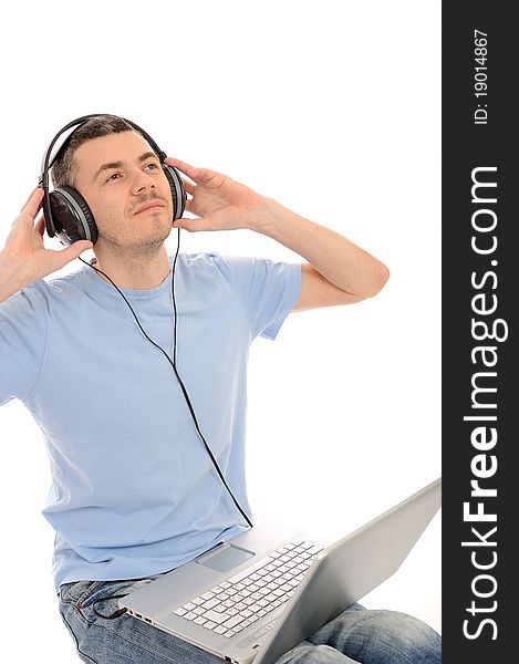 Casual Man Listening To Music In Headphones