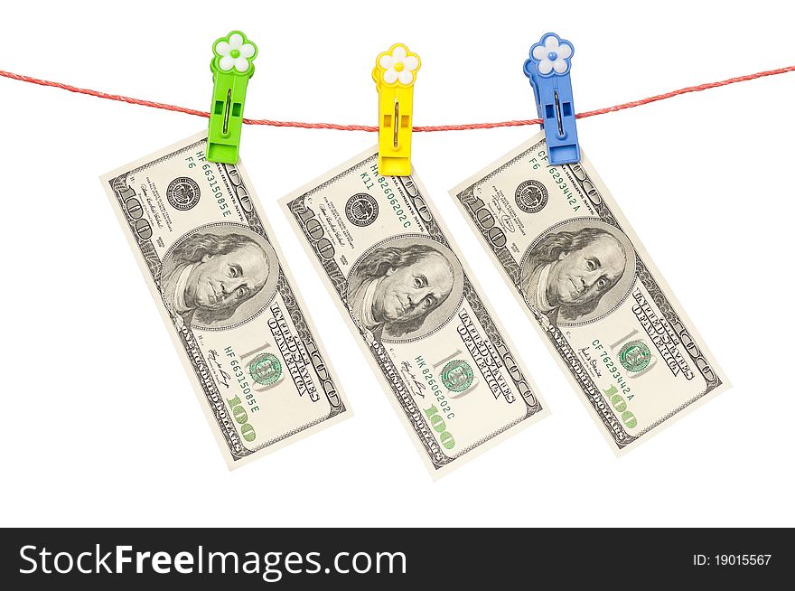 One hundred dollars bill hanging on a clothesline isolated on white background. One hundred dollars bill hanging on a clothesline isolated on white background