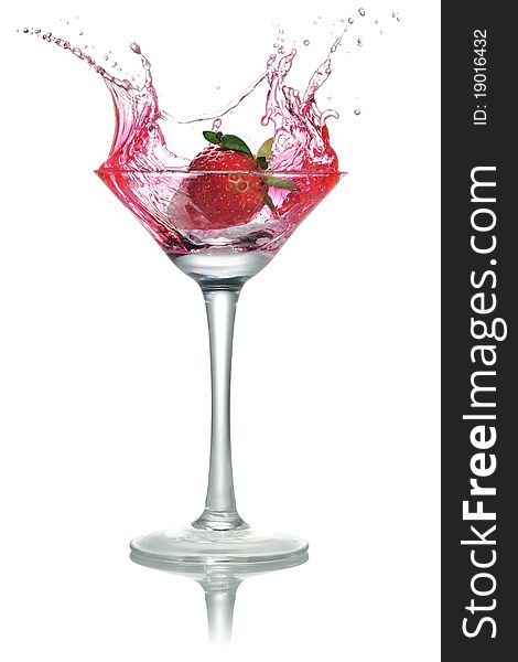 Strawberries, ice cubes into the glass,. Strawberries, ice cubes into the glass,