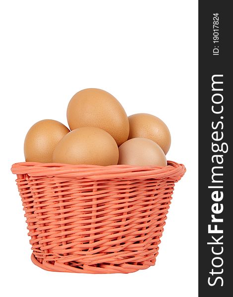 Basket of brown eggs isolated on white bacground. Basket of brown eggs isolated on white bacground