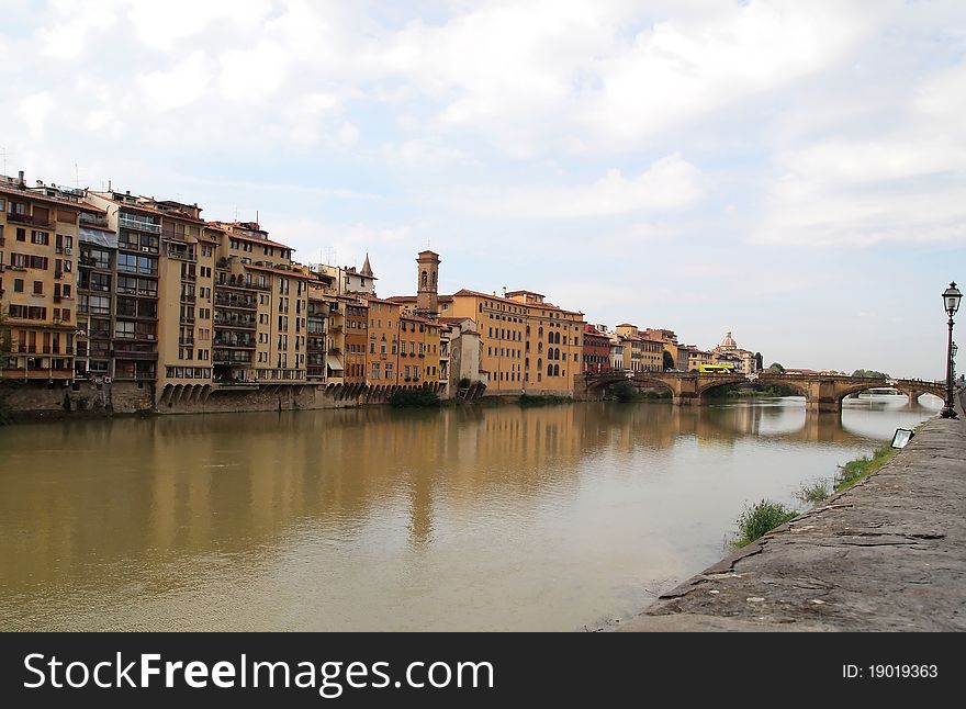 View of Arno river and Ponte alle Grazie Bridge Firenze , Florence - Italy. View of Arno river and Ponte alle Grazie Bridge Firenze , Florence - Italy