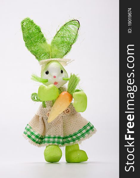 Green lady bunny posing with charm.