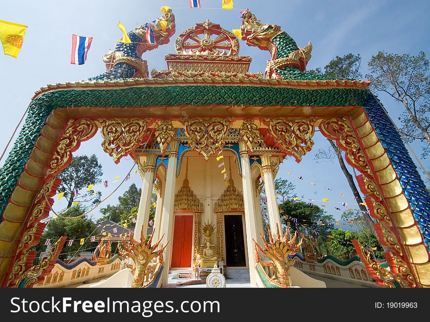 Serpents at entrance to Thai church.