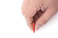 Little Pencil In A Big Hand Royalty Free Stock Photos