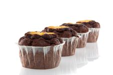 Four Tasteful Chocolate Muffins Royalty Free Stock Photography Four Tasteful Chocolate Muffins Royalty Free Stock Photography