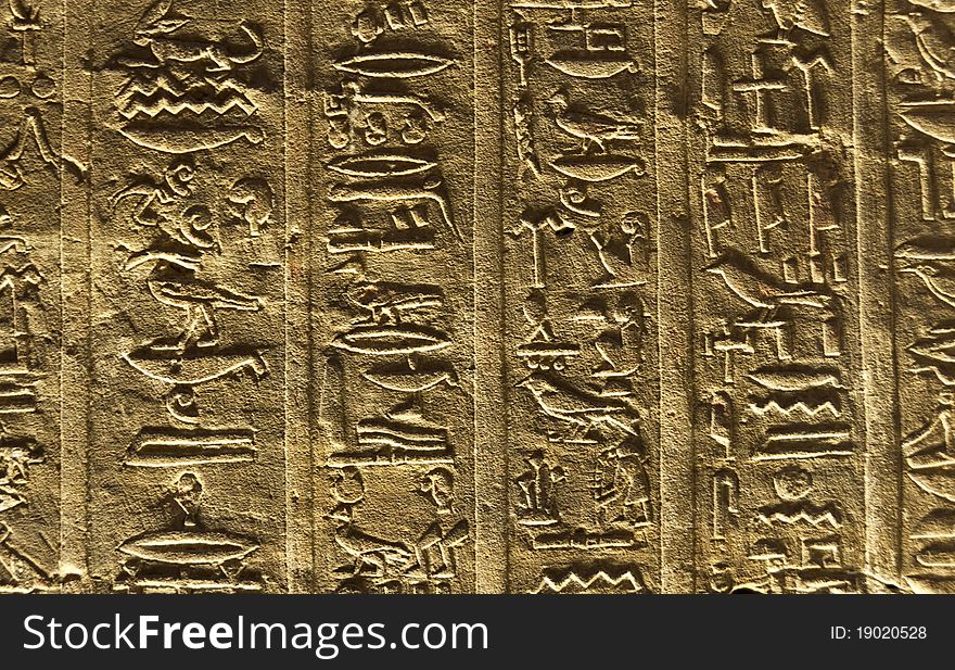 Texture. Detail of some hieroglyphics on the walls of an egyptian temple