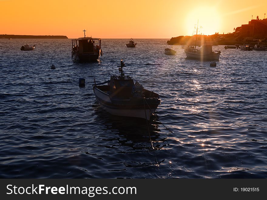 Sailing yatch in the sunset