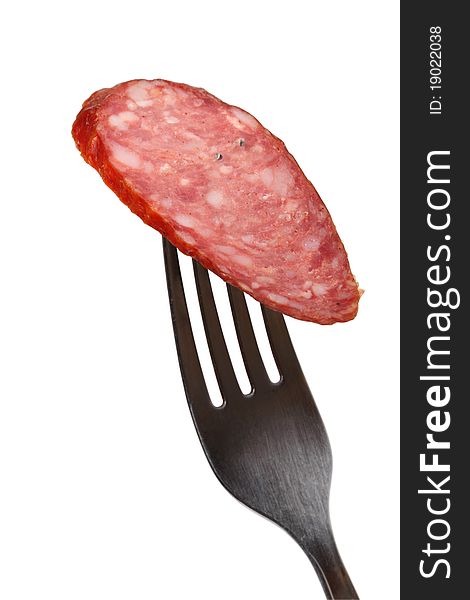 Smoked sausage on a fork