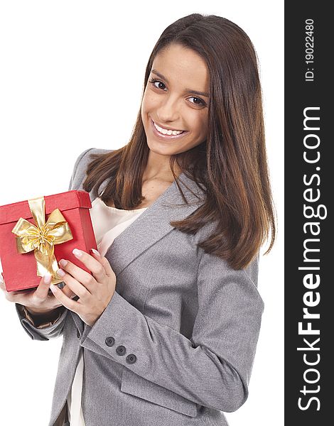 A beautiful woman holding a red gift box