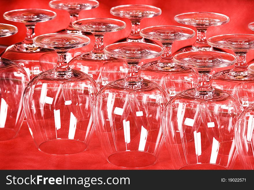 Pure glasses on a red background