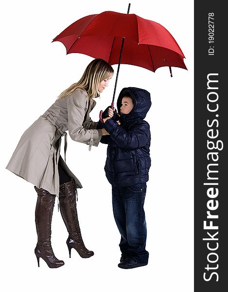 Happy smiling woman and child under their umbrellas. Happy smiling woman and child under their umbrellas