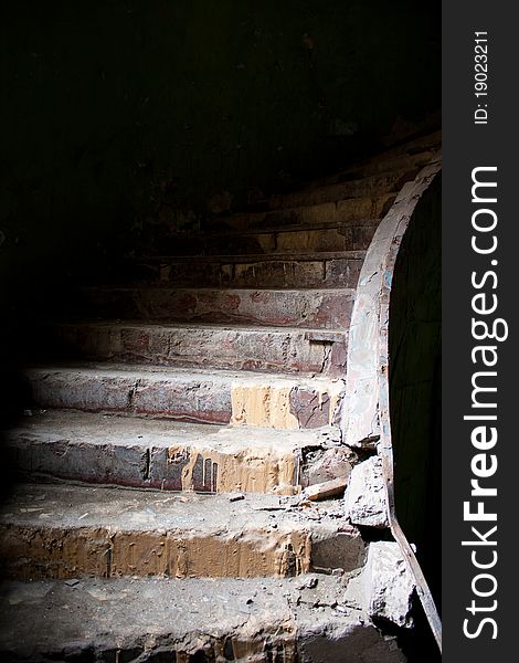 Old broken staircase in the abandoned house