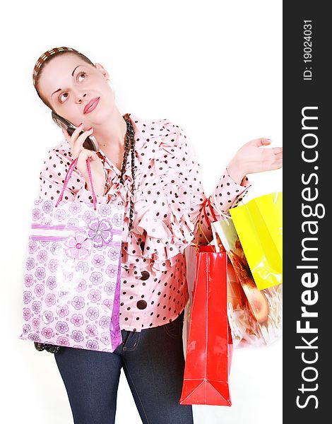 Woman with purchases on a white background