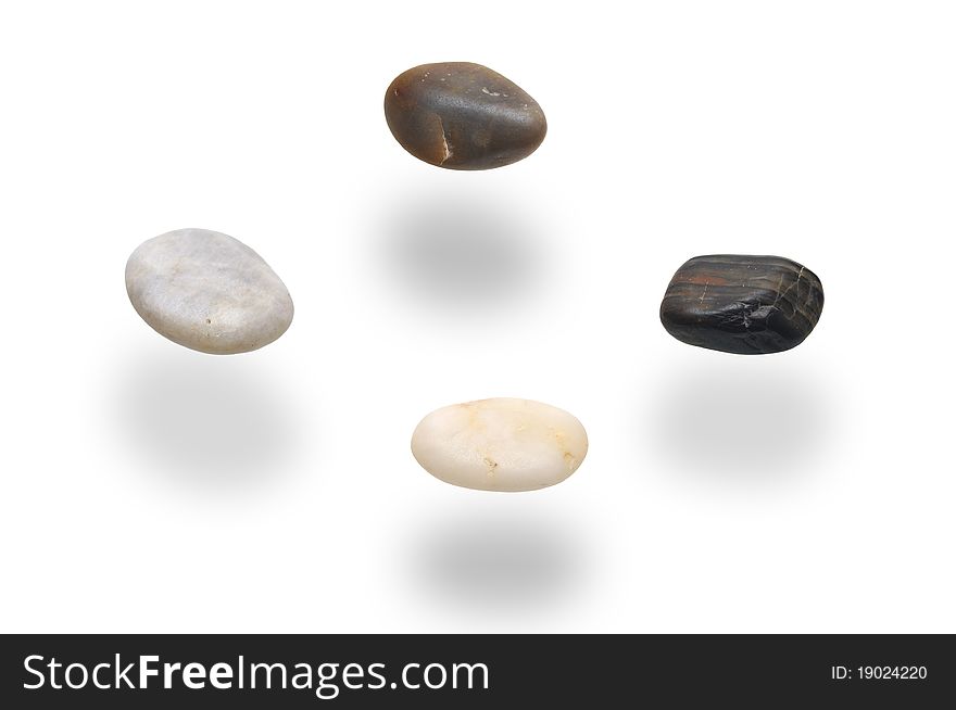 Levitation stones over white background