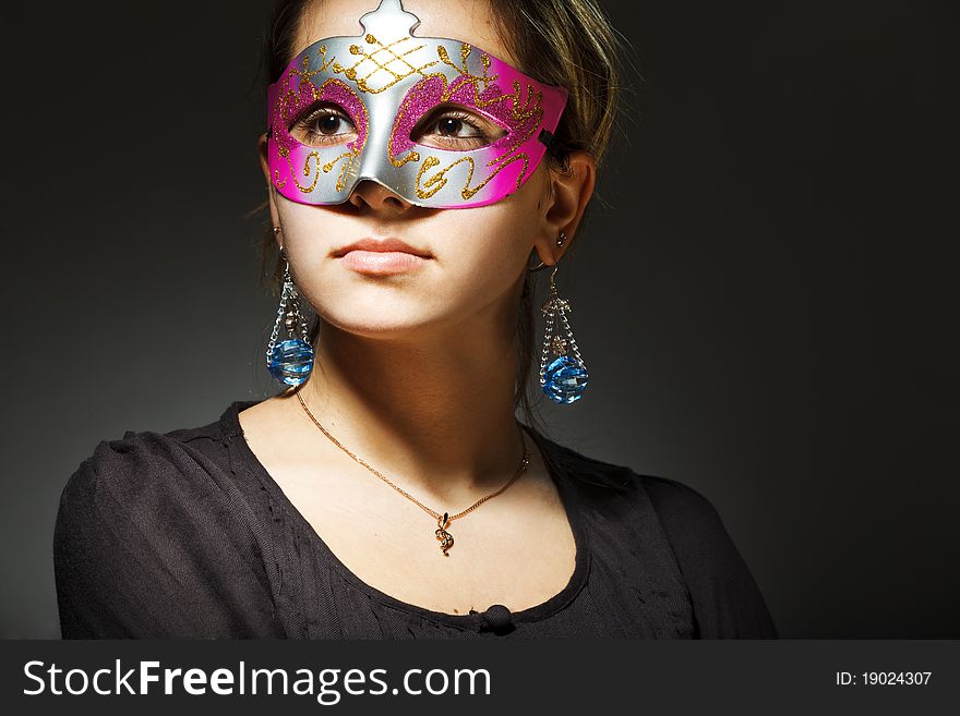 Beautiful Young Woman Wearing Carnival Mask