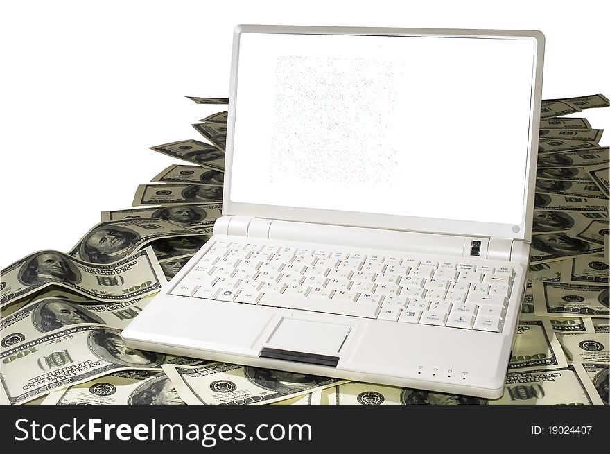 Isolated laptop on a heap of dollars and a hand with a money. Isolated laptop on a heap of dollars and a hand with a money