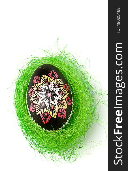 Easter Eggs In Nest On Green