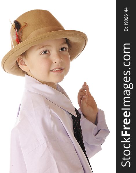 Head and shoulders portrait of a handsome kindergartner dressed in his grandpa's hat, shirt and tie. Isolated on white. Head and shoulders portrait of a handsome kindergartner dressed in his grandpa's hat, shirt and tie. Isolated on white.