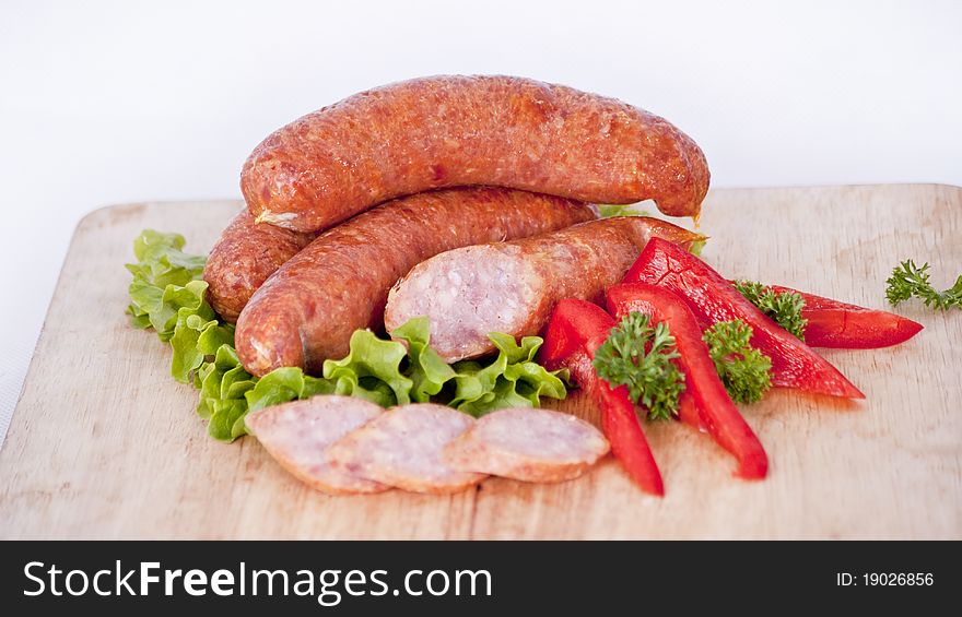 Sausages with hot pepper, still life. Sausages with hot pepper, still life