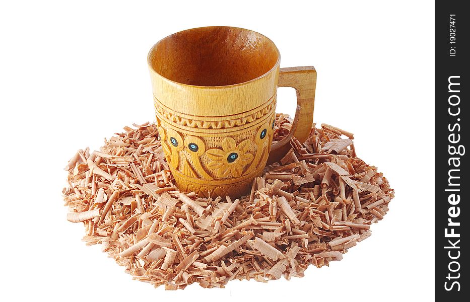 Wooden  Mug And Juniper Shavings Isolated On White