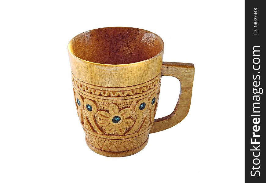 Wooden  carved  mug with pattern isolated on white