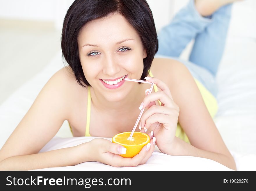 Girl with Orange on a light background