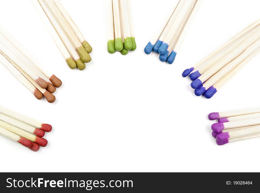 Many colored matches isolated on a white background