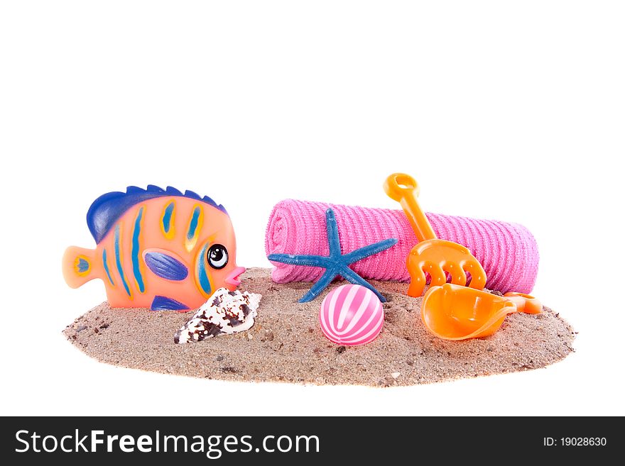 Colorful beachtoys for a nice day at the beach isolated over white. Colorful beachtoys for a nice day at the beach isolated over white