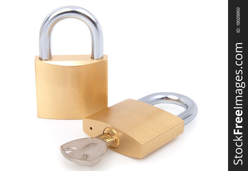 Golden closed padlock with key