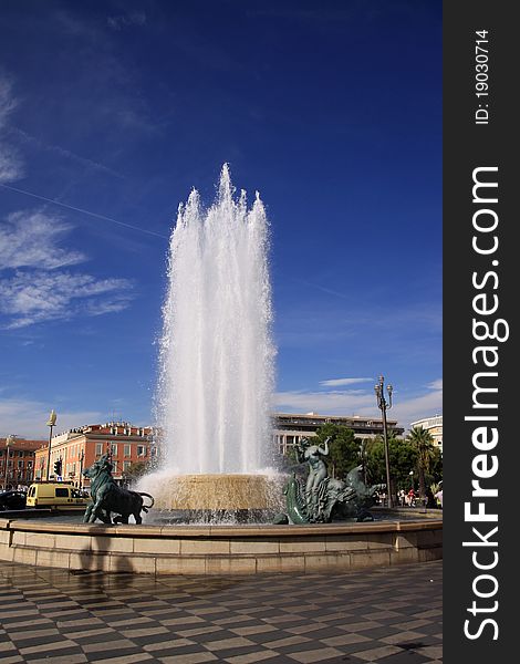 Fountain under the blue sky in Nice