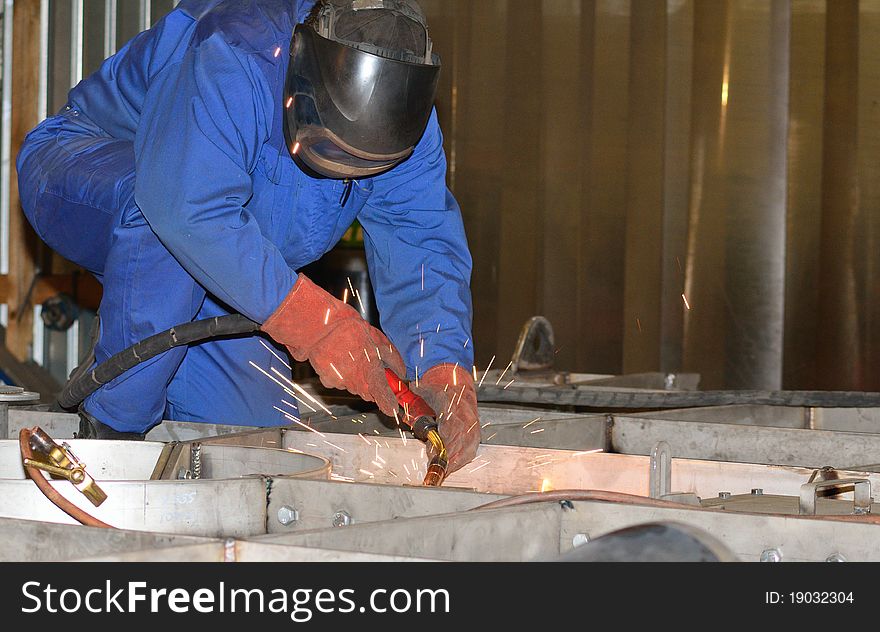 Welder working. Industrial photo.