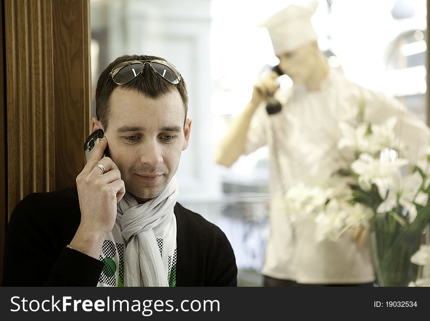 Portrait of happy smiling man, in bisness center