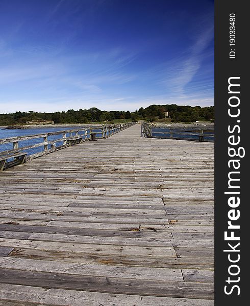 On the wood pier looking back towards land. On the wood pier looking back towards land