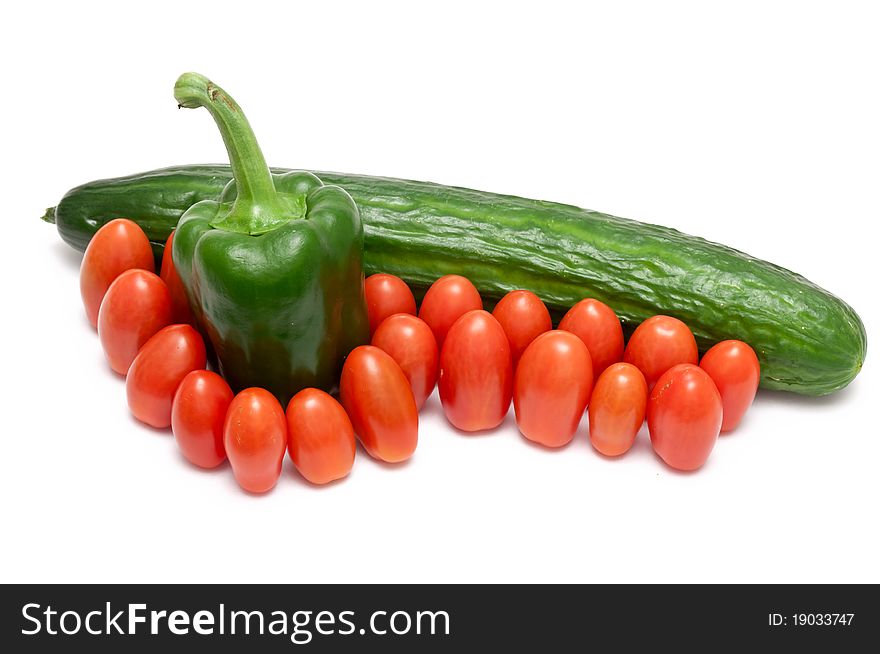 Some fresh vegetables over a white background