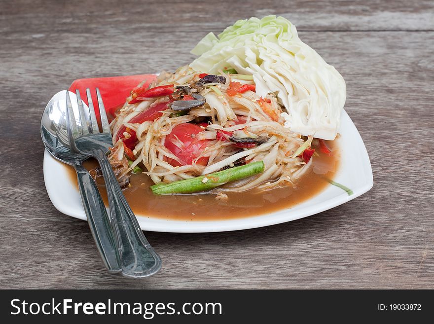 Papaya salad or som tum is a spicy food most popular in thailand